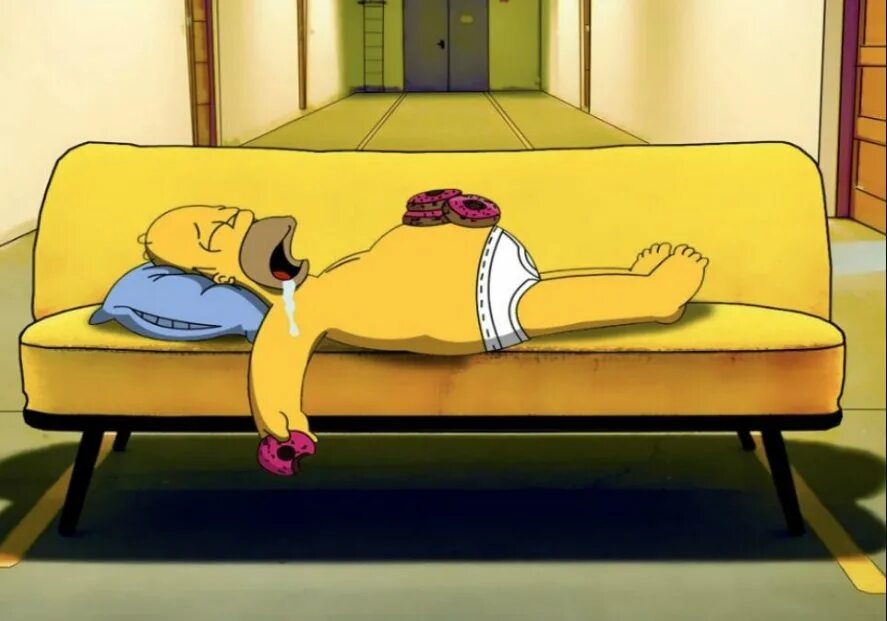 Лентяй ест греется а работает. Ленивый гомер. Гомер лежит на диване.